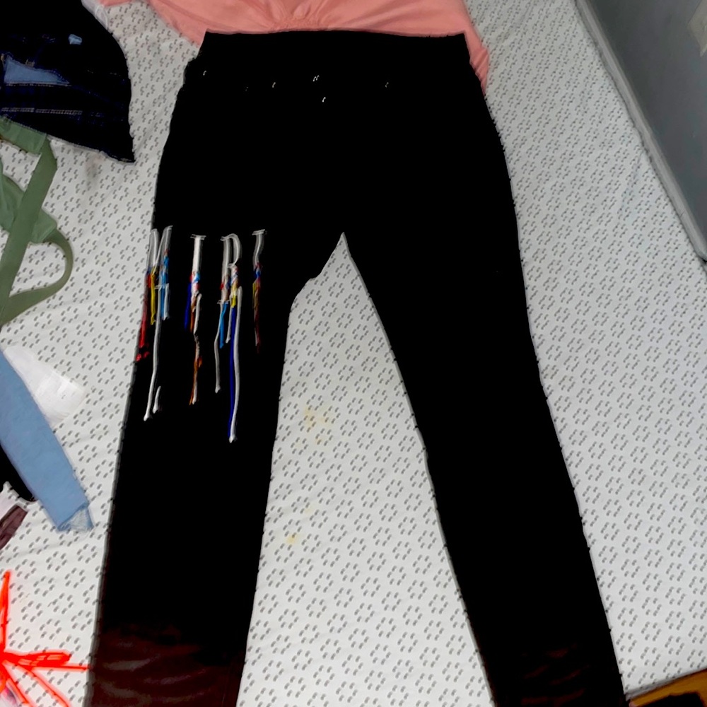 Amiri paint splatter jean